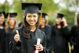 graduation girl holding her diploma with pride.jpeg