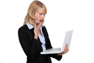 Worried_woman_with_laptop.jpg